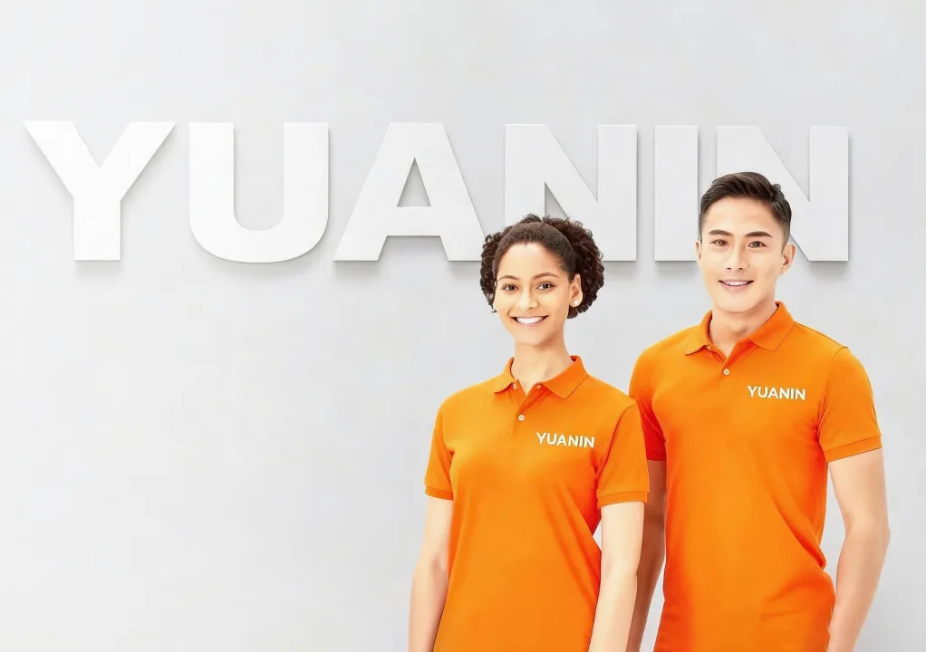 YUANIN team in front of the brand wall